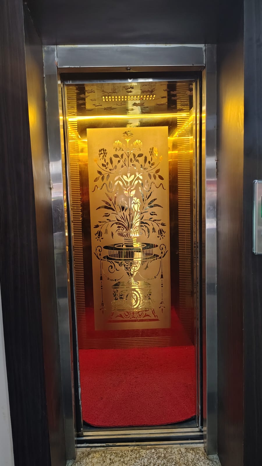 Bandhan Vatika premium gold elevator interior