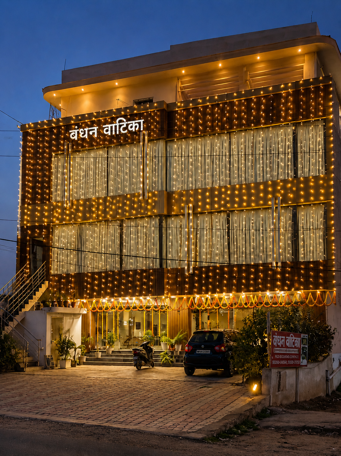 Bandhan Vatika illuminated building at night